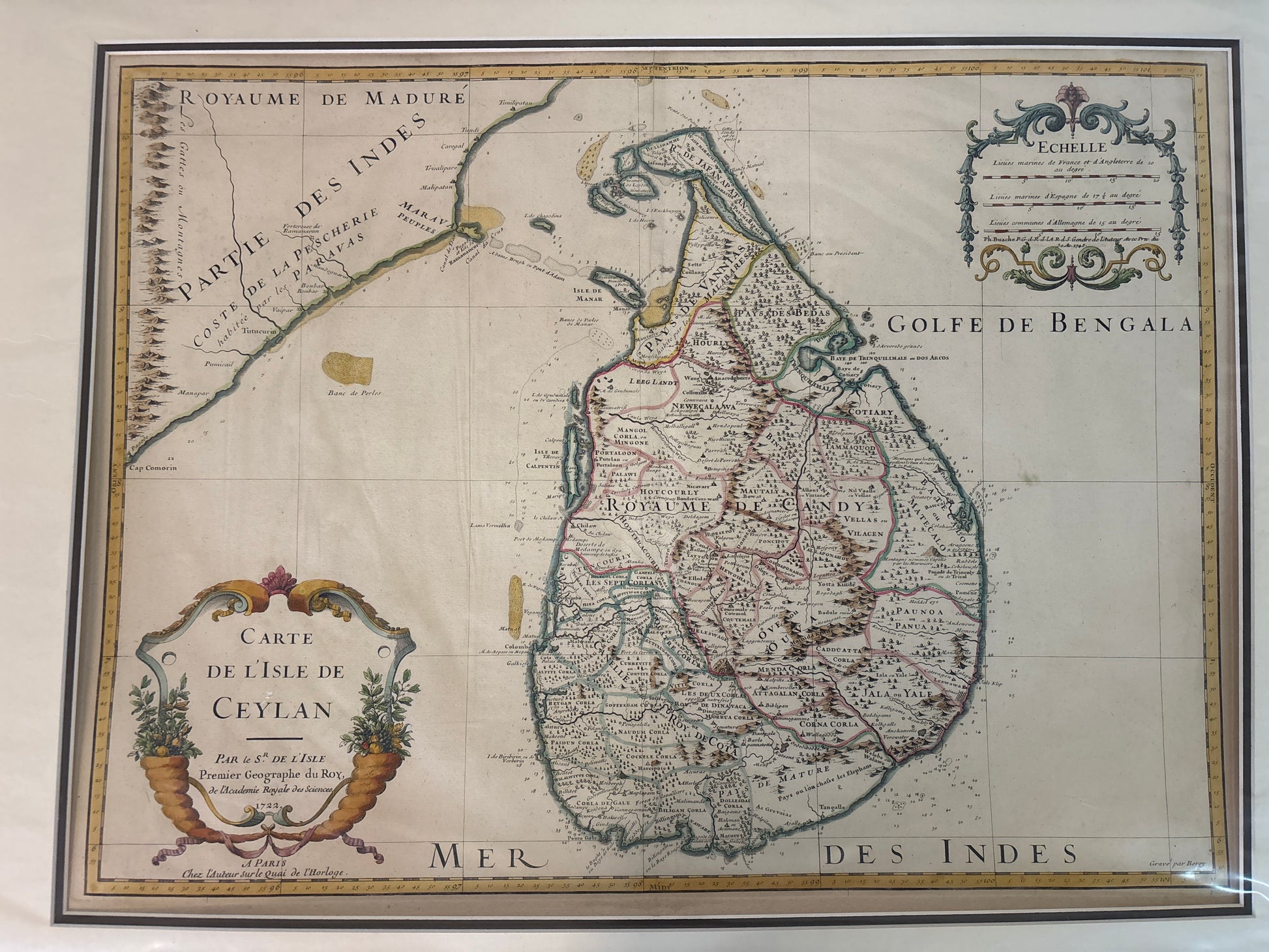 Vintage map of Sri Lanka and surrounding regions with decorative elements.