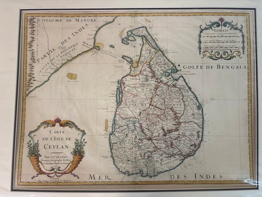 Vintage map of Sri Lanka and surrounding regions with decorative elements.