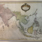 Vintage map of Asia and surrounding regions with decorative elements.